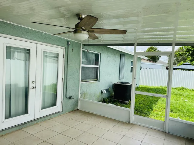 a view of a porch with furniture