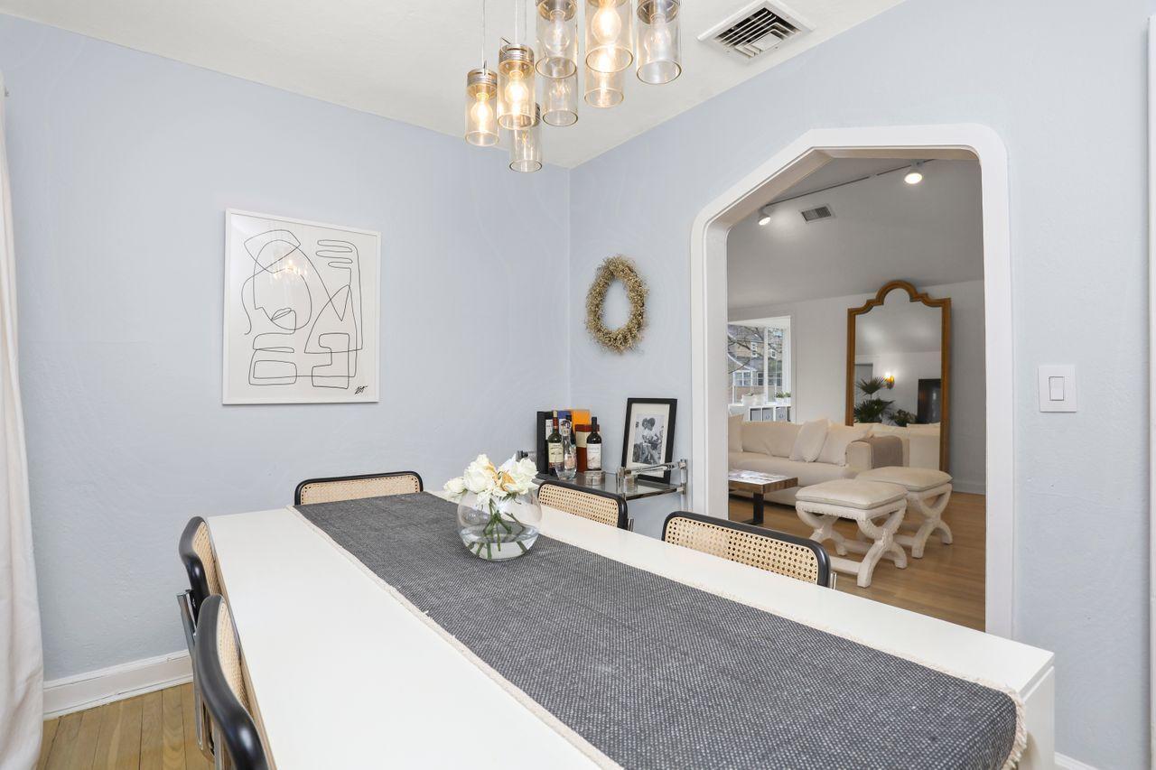 55 Oval Avenue Riverside, CT 06878 - Photo 15 of 29 a view of a dining room with furniture and a chandelier