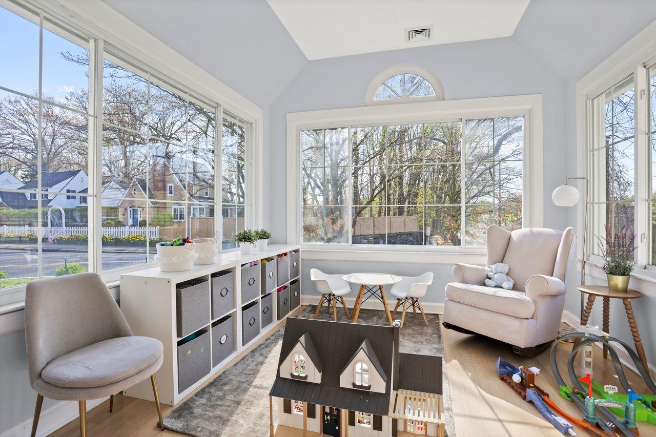 55 Oval Avenue Riverside, CT 06878 - Photo 7 of 29 a living room with furniture and a large window
