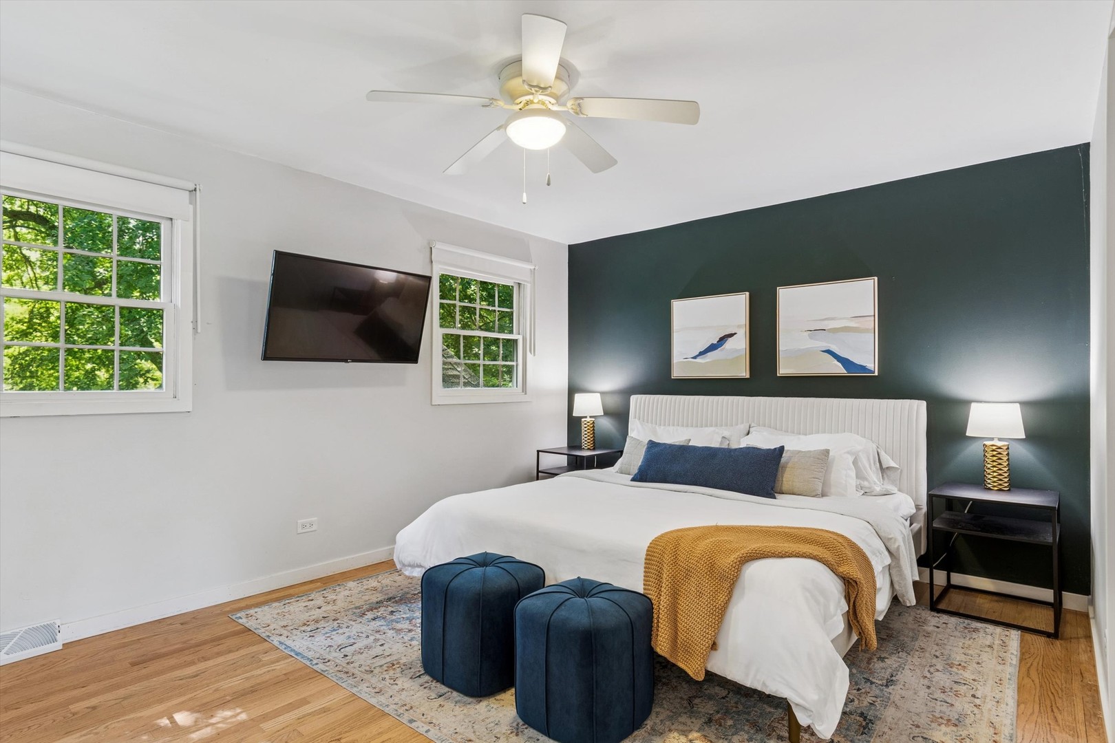 24331 Davids Court Naperville, IL 60564 - Photo 8 of 24 a bedroom with a bed a tv and wooden floor