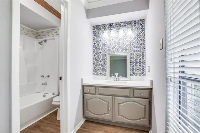 a view of bathroom with dual sinks