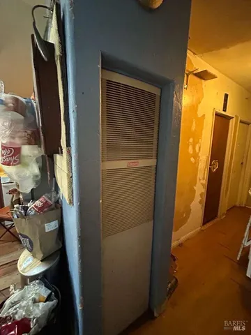 a bathroom with a toilet a sink and shower