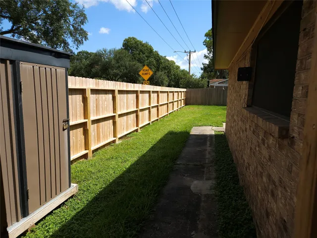 a view of backyard with green space