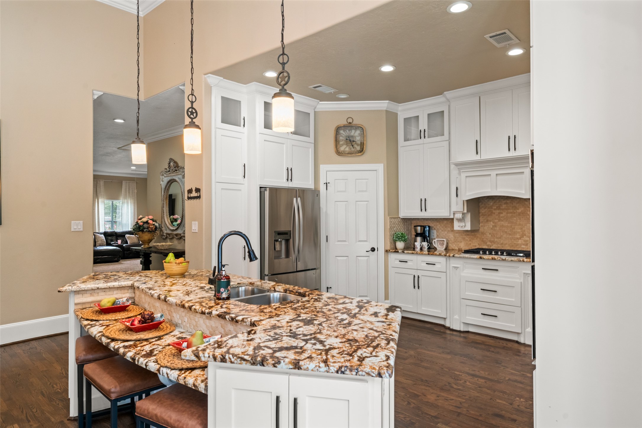 32660 Willow Bend Road Waller, TX 77484 - Photo 12 of 47 Functional kitchen layout with ample cabinetry, expansive countertops, recessed lighting, and convenient access to the surrounding living spaces.
