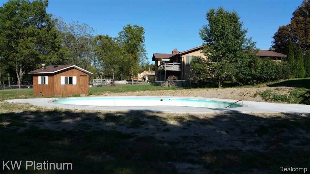 4648 Atkins Road North Street, MI 48049 - Photo 7 of 29 VIEW OF INGROUND POOL