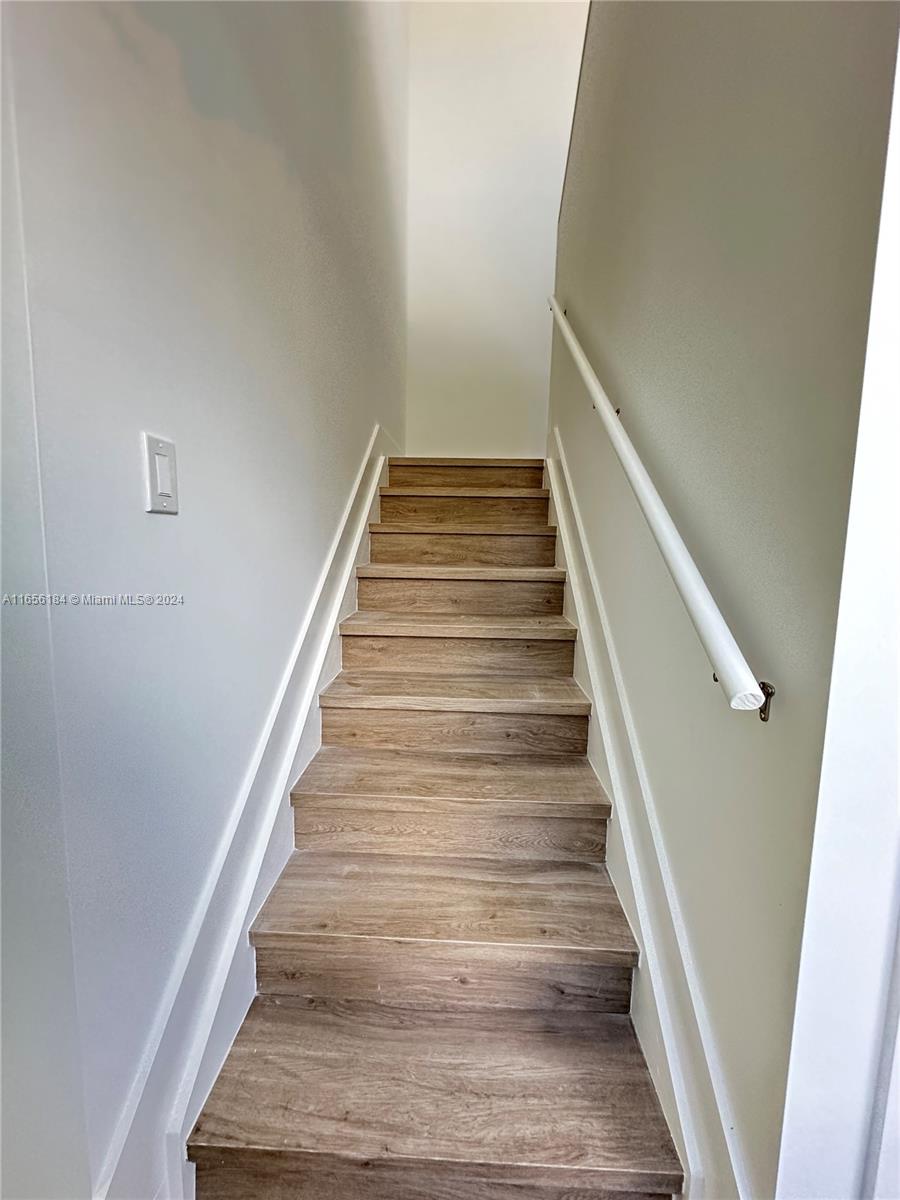 2933 Northwest 57th Street, Unit 2933 Miami, FL 33142 - Photo 6 of 14 a view of entryway