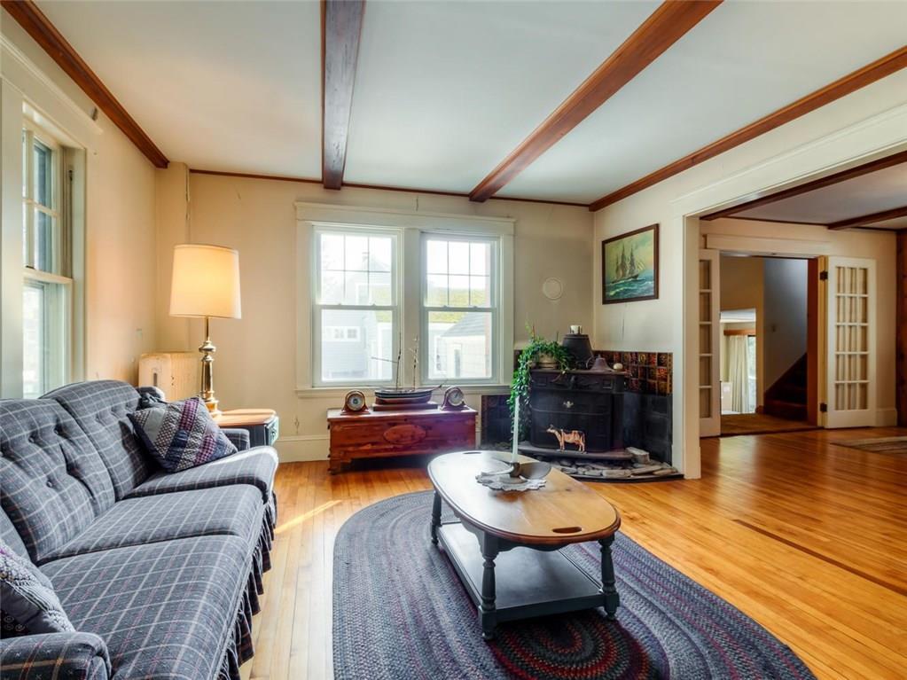 255 Mitchell Road Cape Elizabeth, ME 04107 - Photo 9 of 35 Light-filled living room with...