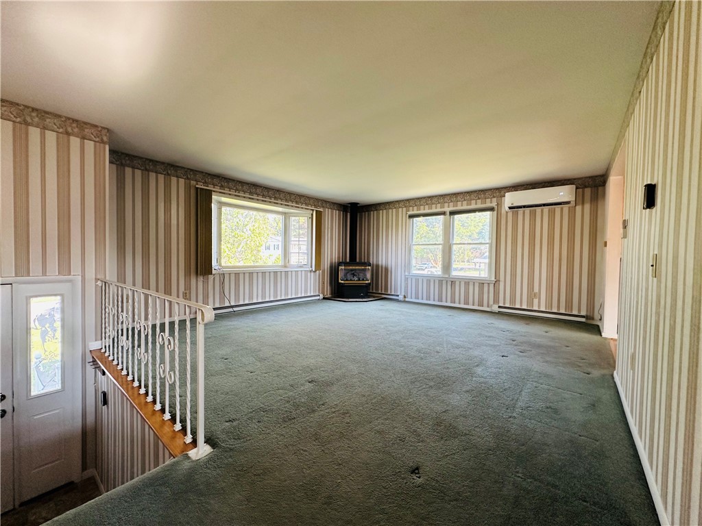 55 Wegman Street Sennett, NY 13021 - Photo 6 of 45 The huge family room on the second floor has both