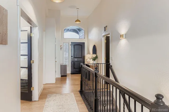 a view of a hallway view with staircase