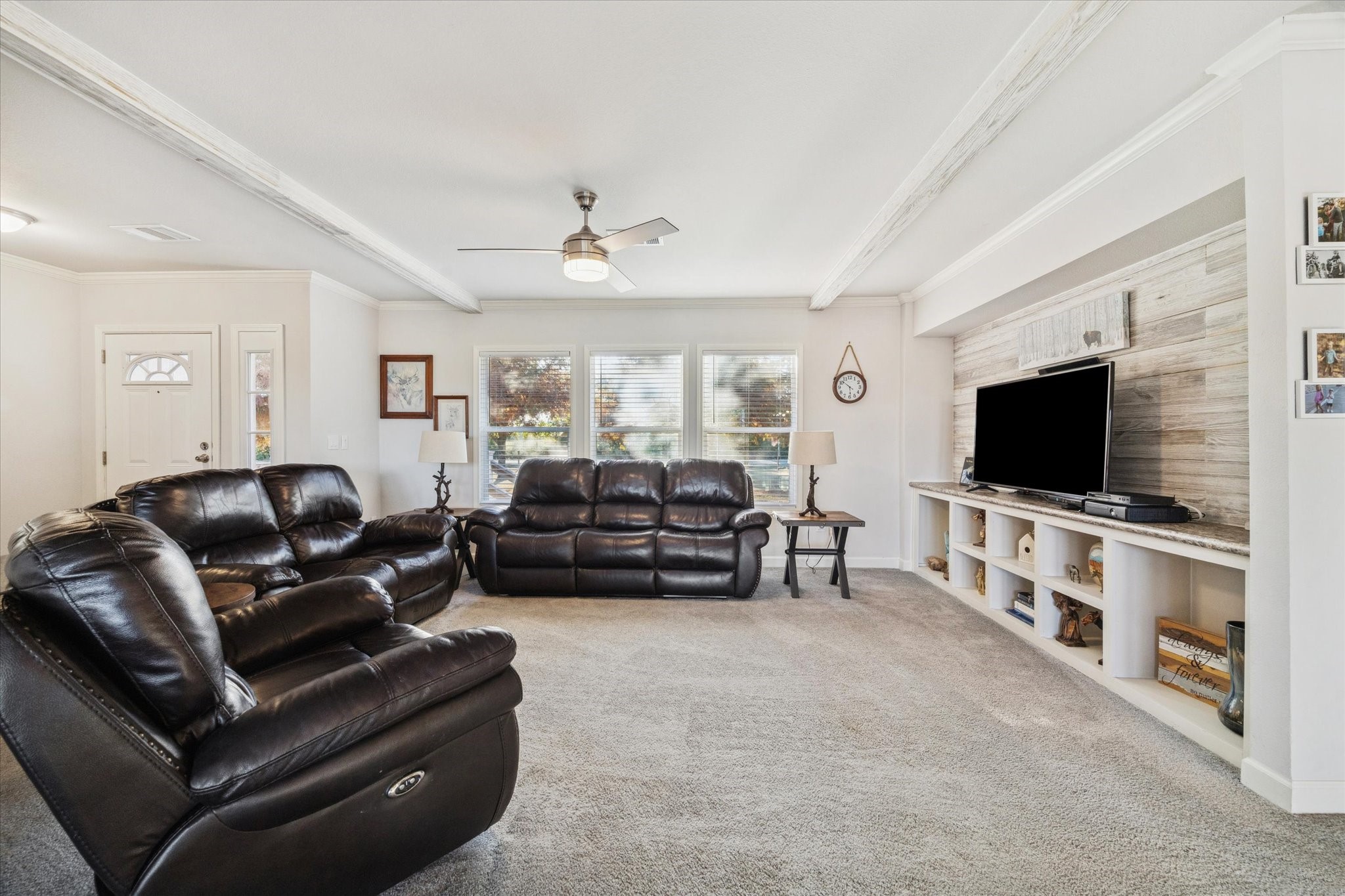 8850 Katy Hockley Road Katy, TX 77493 - Photo 12 of 37 a living room with furniture and a flat screen tv