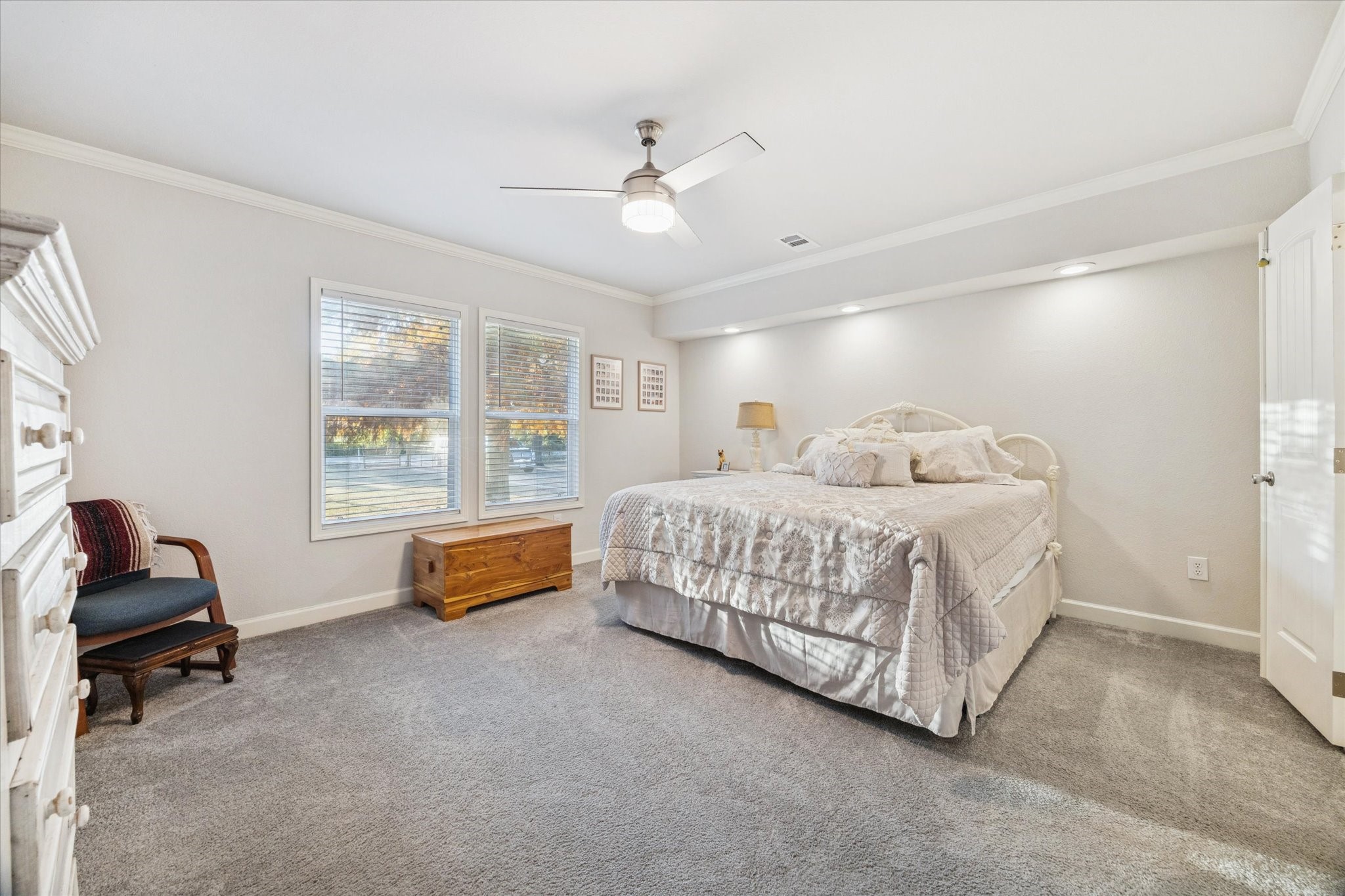 8850 Katy Hockley Road Katy, TX 77493 - Photo 19 of 37 a bedroom with a bed and a chair