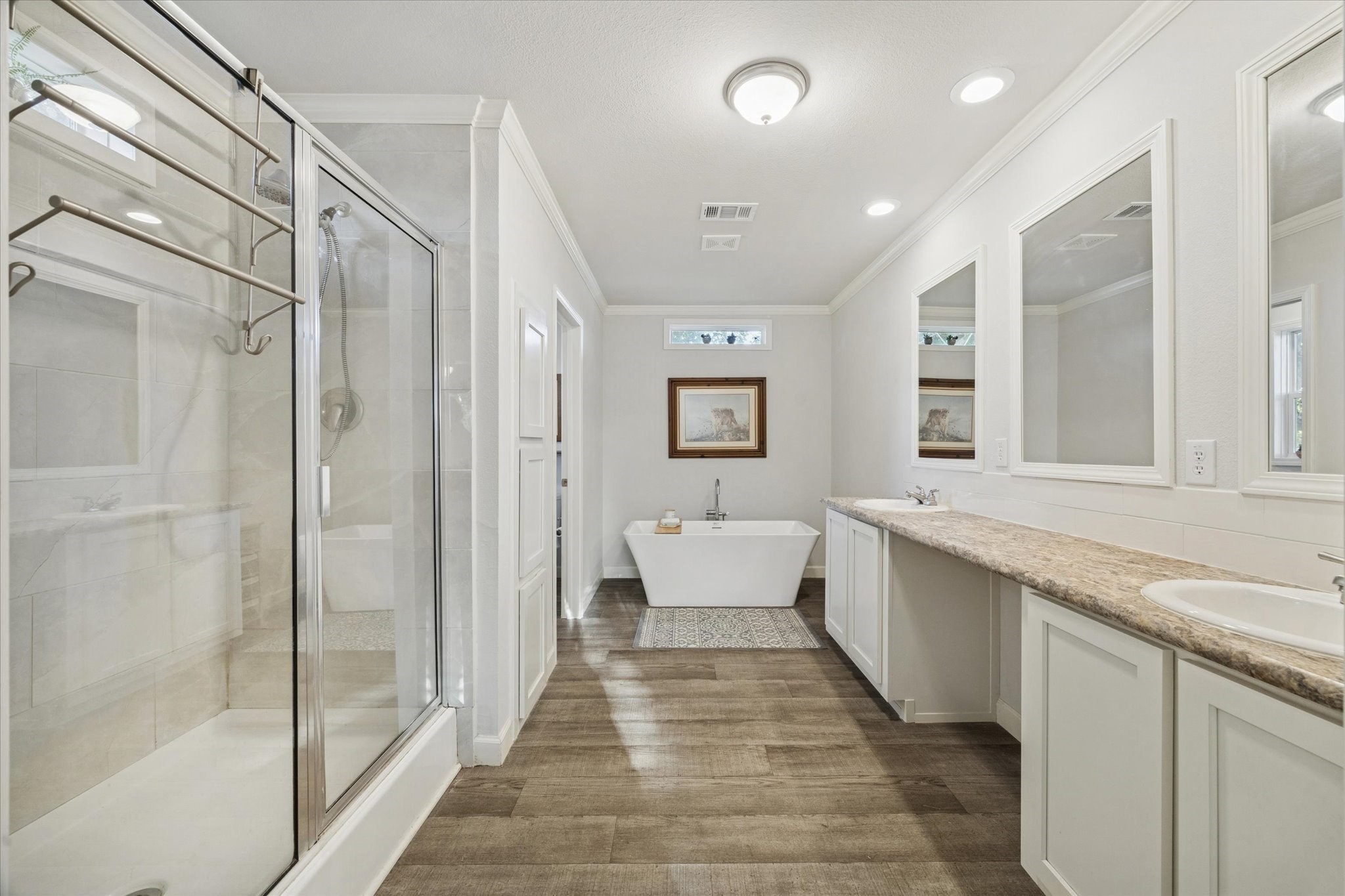 8850 Katy Hockley Road Katy, TX 77493 - Photo 21 of 37 a spacious bathroom with a shower sink and mirror
