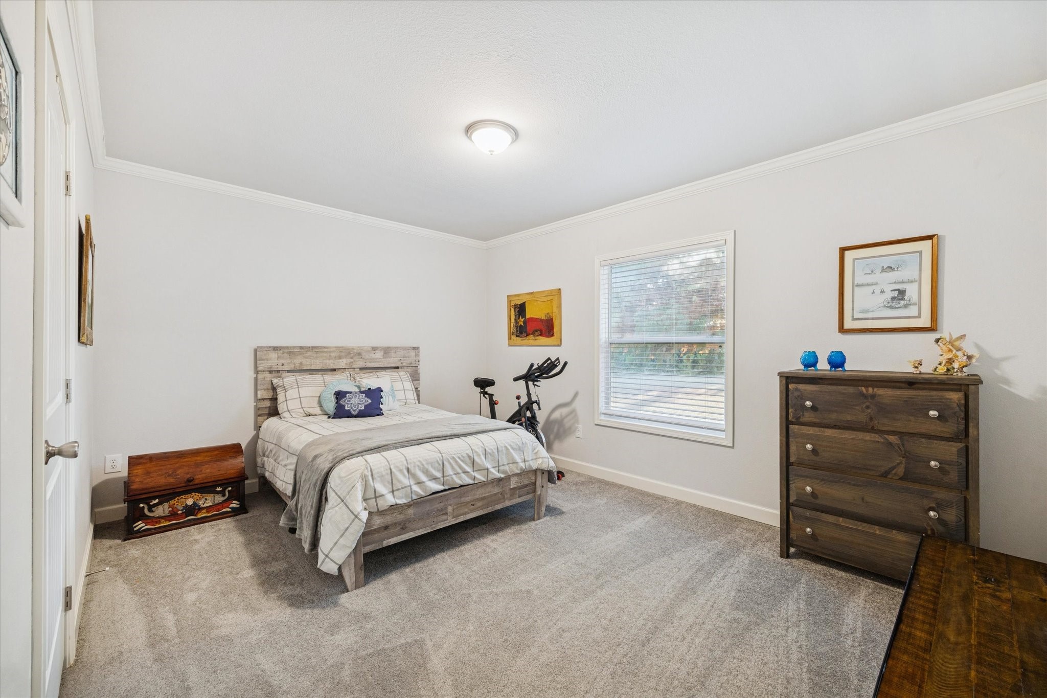8850 Katy Hockley Road Katy, TX 77493 - Photo 24 of 37 a bedroom with a bed and a window