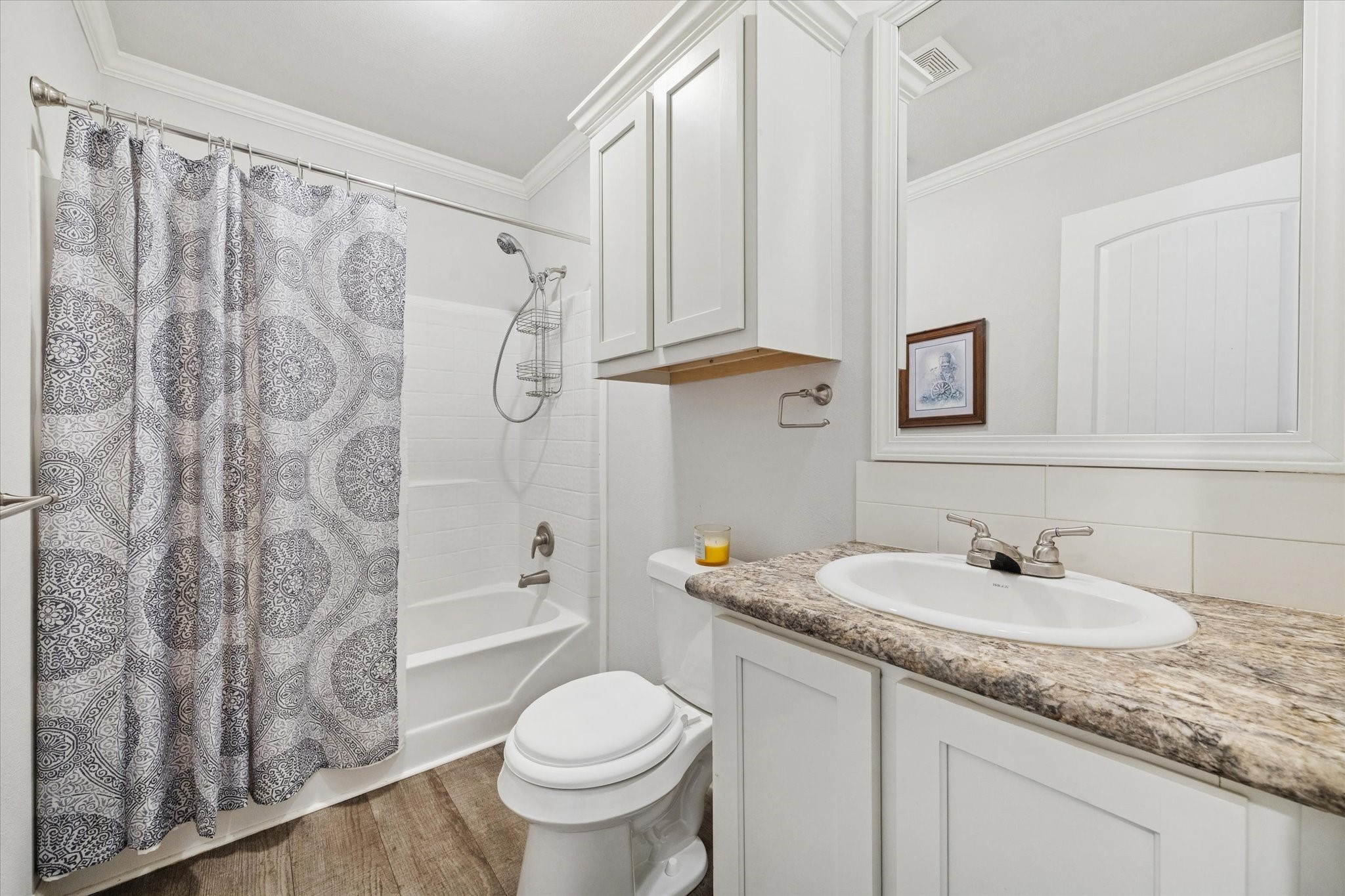8850 Katy Hockley Road Katy, TX 77493 - Photo 26 of 37 a bathroom with a granite countertop sink and a mirror