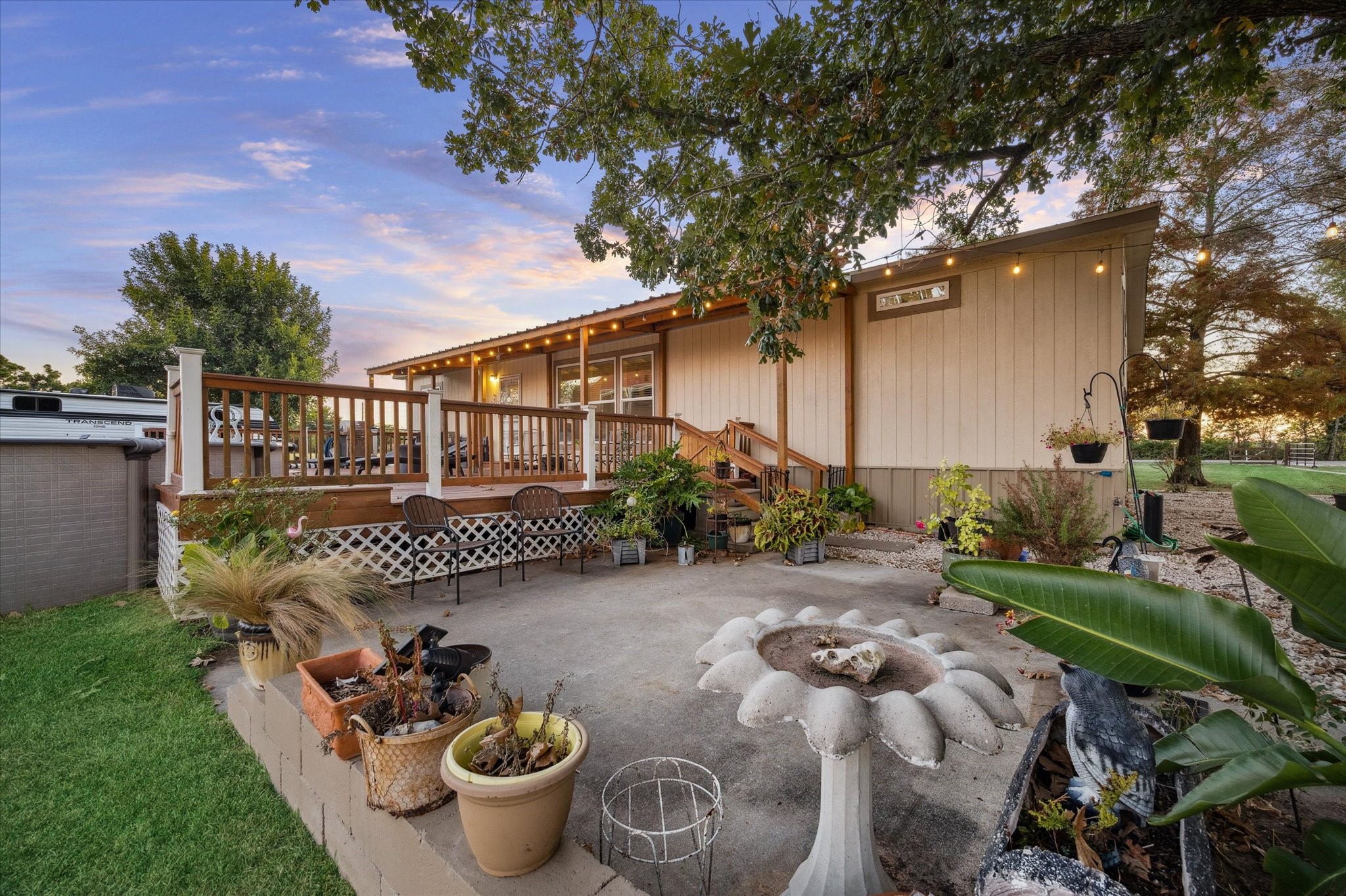 8850 Katy Hockley Road Katy, TX 77493 - Photo 30 of 37 a view of a patio with chair and tables back yard of the house
