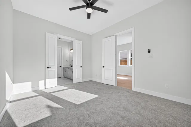 a bathroom with a double vanity sink and mirror