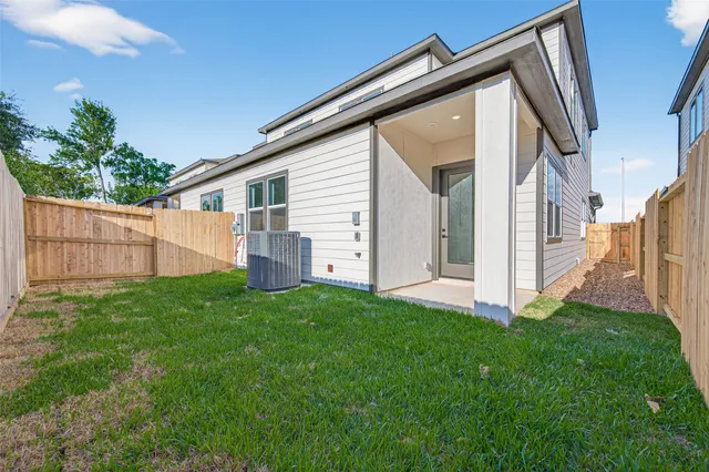 a view of a backyard with a garden and stairs