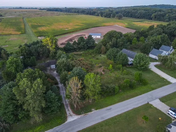 a view of a lake with a yard