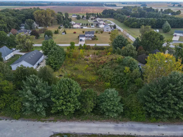 an aerial view of residential house with outdoor space