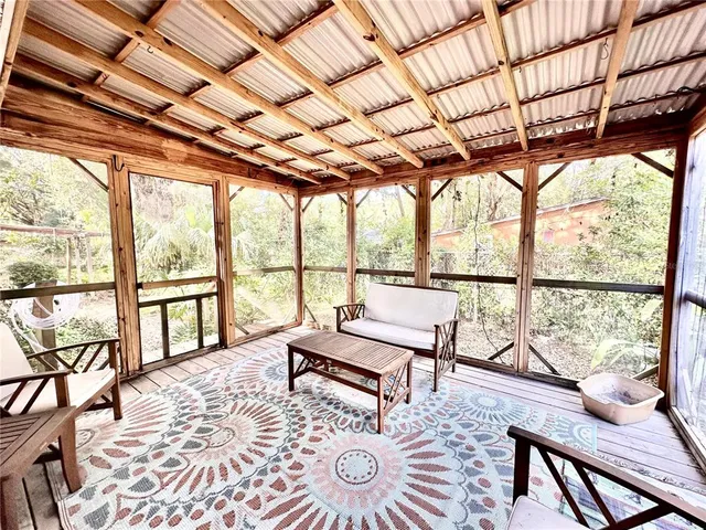 a living room with large windows