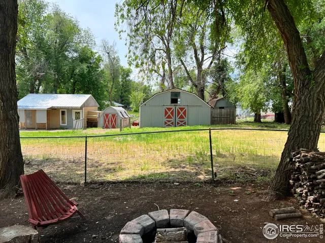 a table and chairs in a patio