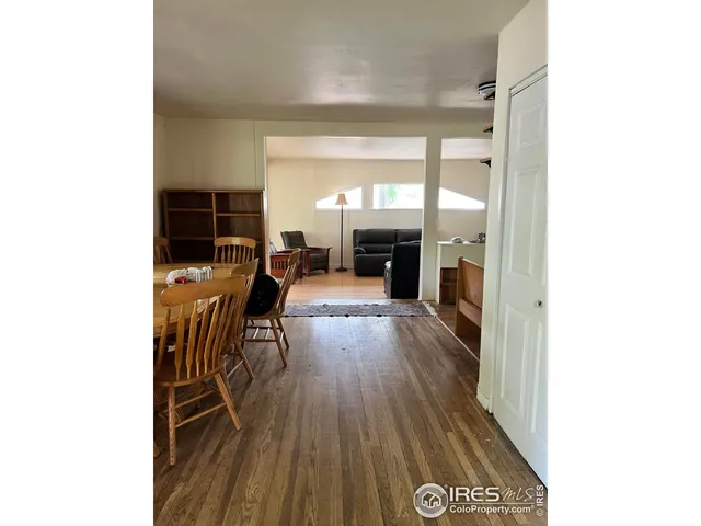 a kitchen with a sink cabinets and appliances