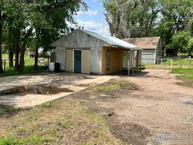 a view of entryway with furniture and a rug