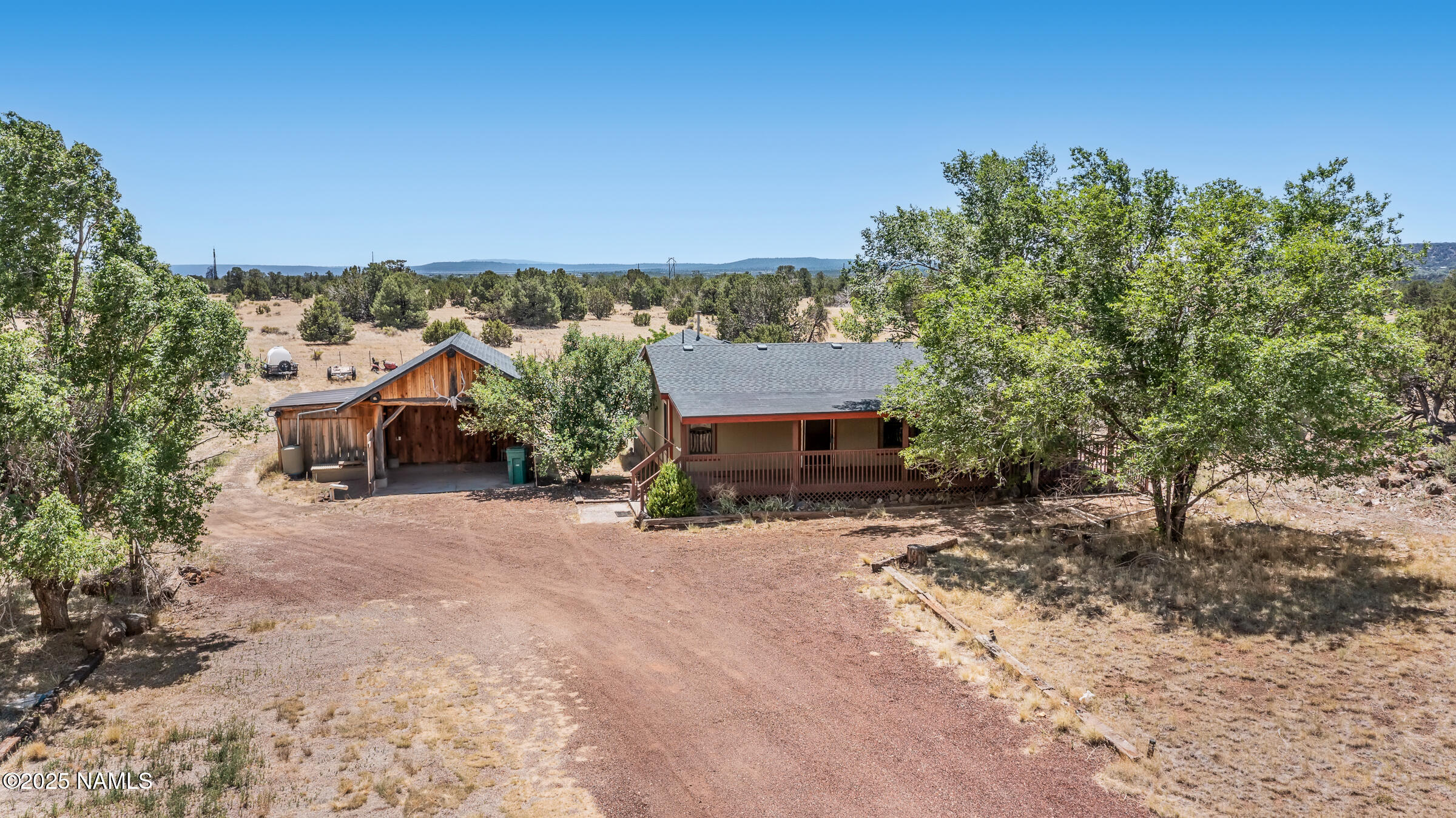 10350 Ghost Rider Trail Flagstaff, AZ 86004 - Photo 1 of 39 a view of a house with a outdoor space