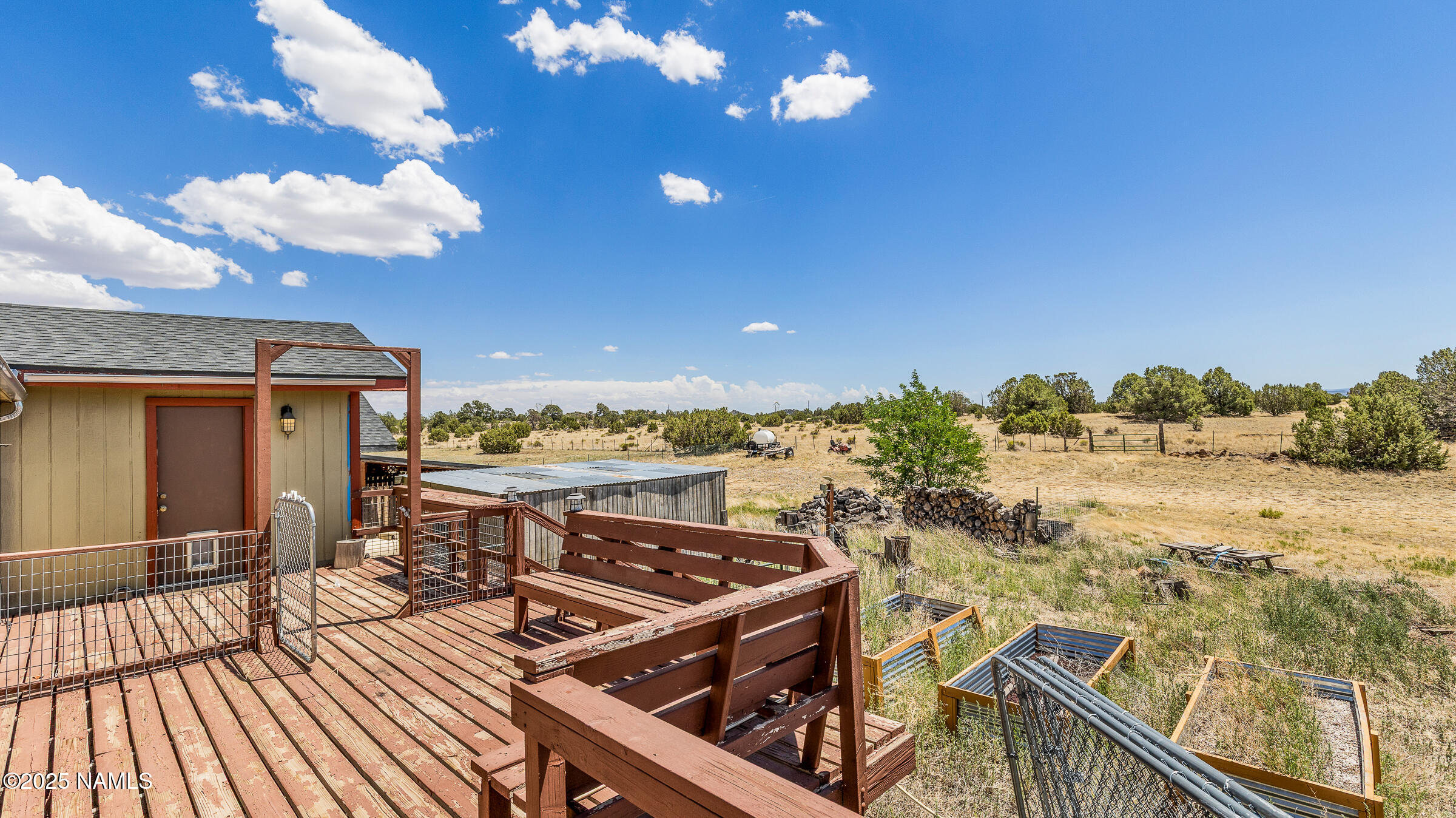 10350 Ghost Rider Trail Flagstaff, AZ 86004 - Photo 21 of 39 a view of a balcony with wooden floor