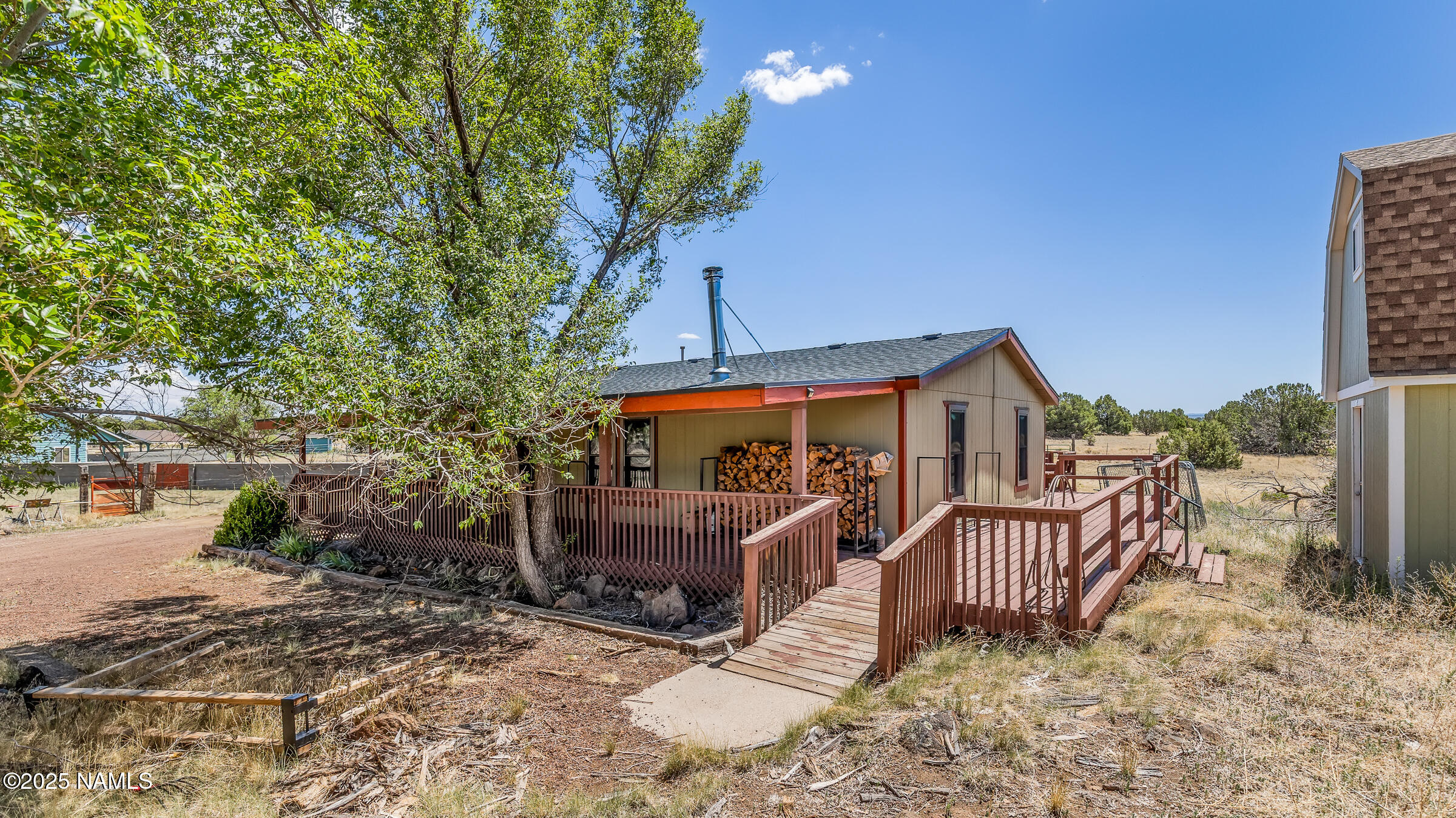 10350 Ghost Rider Trail Flagstaff, AZ 86004 - Photo 3 of 39 a view of a house with a yard