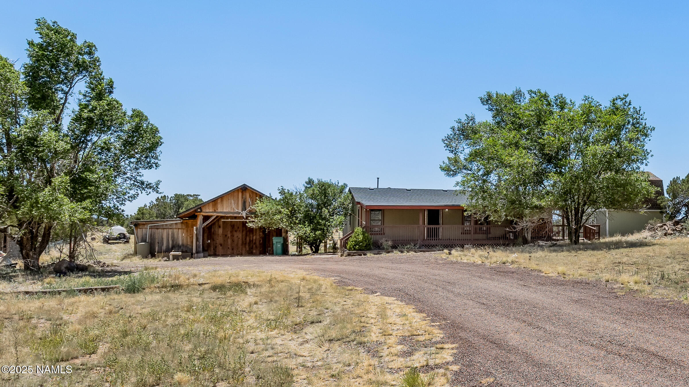 10350 Ghost Rider Trail Flagstaff, AZ 86004 - Photo 39 of 39 a view of a house with a yard