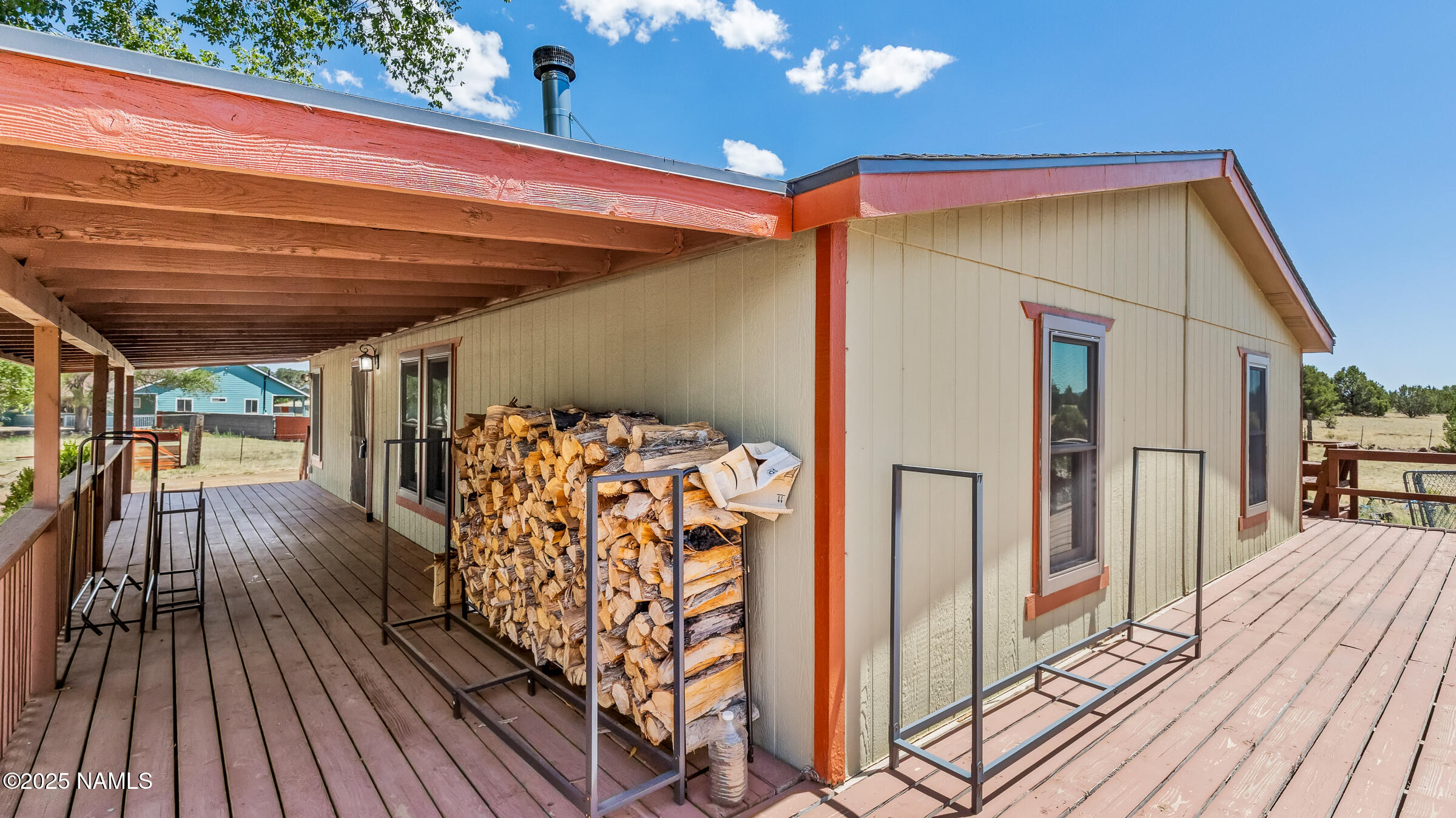10350 Ghost Rider Trail Flagstaff, AZ 86004 - Photo 4 of 39 a front view of a house with a patio