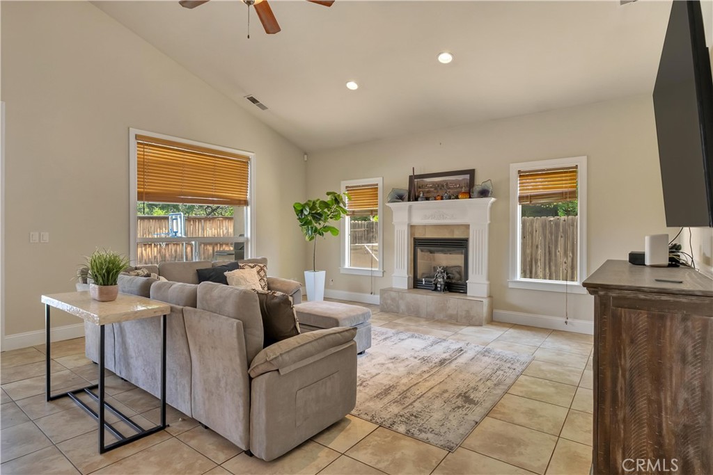 39 Redeemers Loop Chico, CA 95973 - Photo 11 of 55 a living room with furniture and a fireplace