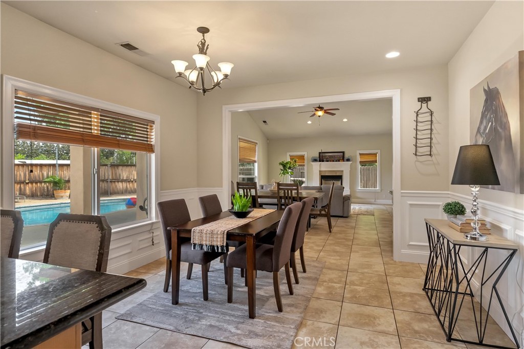 39 Redeemers Loop Chico, CA 95973 - Photo 16 of 55 a view of a dining room with furniture window and outside view