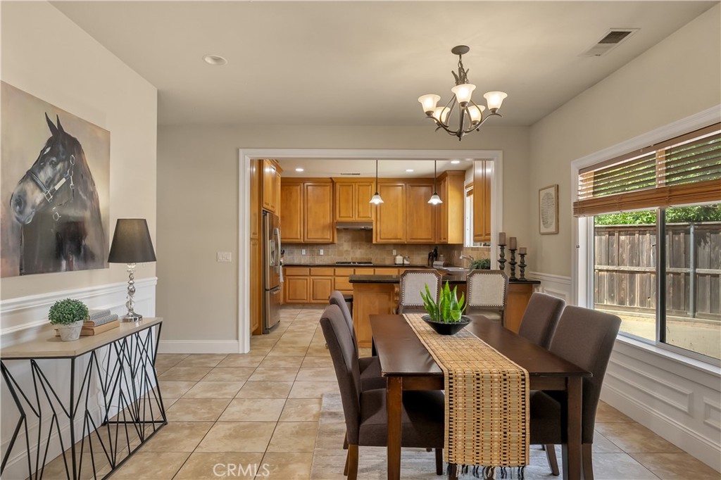 39 Redeemers Loop Chico, CA 95973 - Photo 18 of 55 a view of a dining room with furniture window and outside view