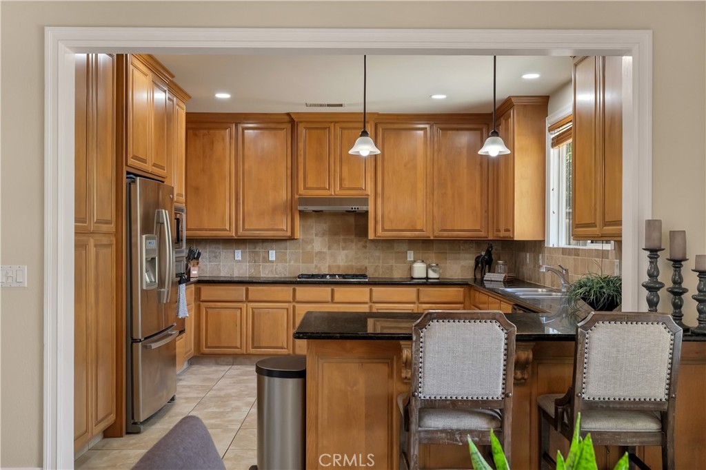 39 Redeemers Loop Chico, CA 95973 - Photo 23 of 55 a kitchen with a sink cabinets and window
