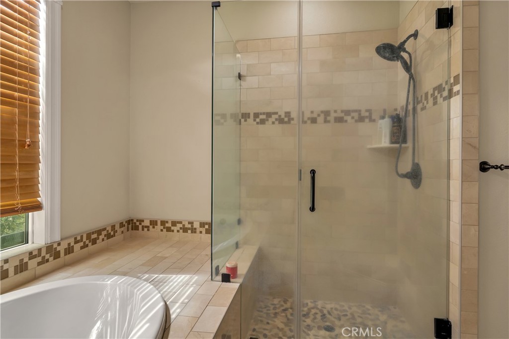 39 Redeemers Loop Chico, CA 95973 - Photo 34 of 55 a bathroom with a bathtub and shower