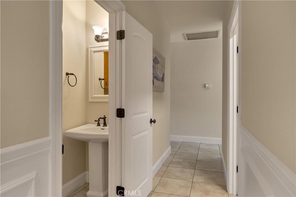 39 Redeemers Loop Chico, CA 95973 - Photo 36 of 55 a bathroom with a sink and mirror