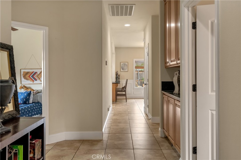 39 Redeemers Loop Chico, CA 95973 - Photo 41 of 55 a view of a hallway with wooden floor windows and livingroom