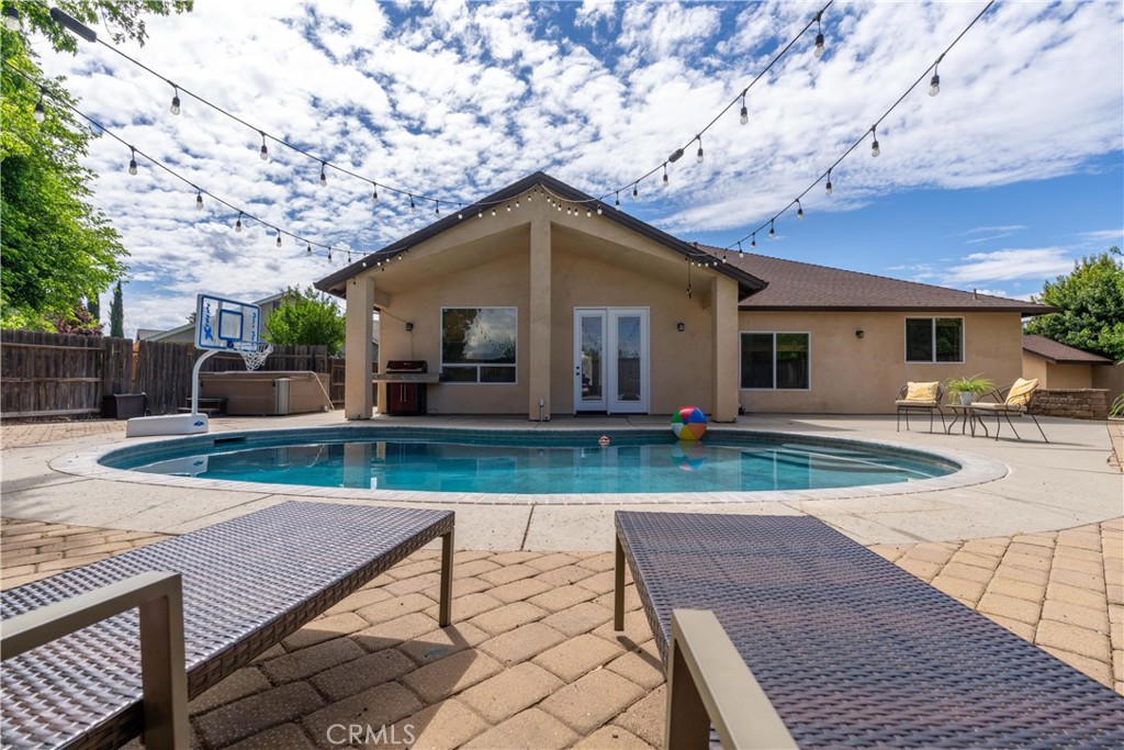 39 Redeemers Loop Chico, CA 95973 - Photo 47 of 55 a view of a house with backyard and a tree