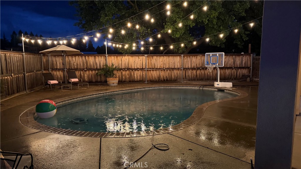 39 Redeemers Loop Chico, CA 95973 - Photo 49 of 55 a view of a swimming pool with a outdoor seating