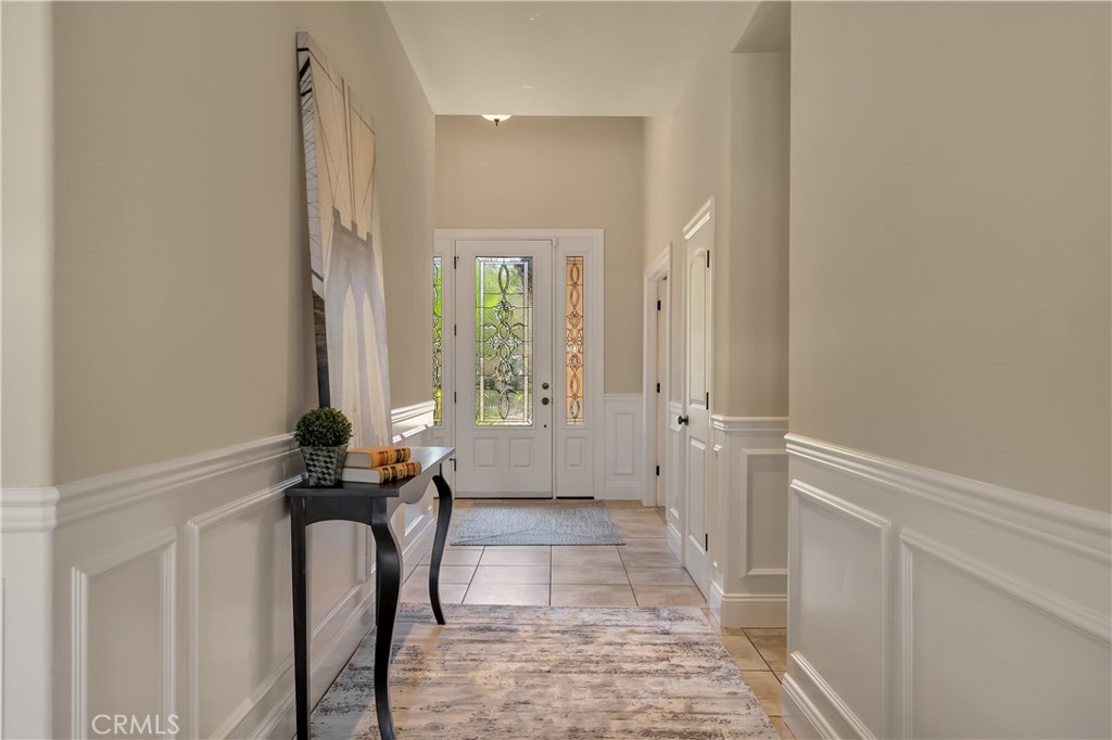 39 Redeemers Loop Chico, CA 95973 - Photo 7 of 55 a view of a hallway with wooden floor and a bathroom