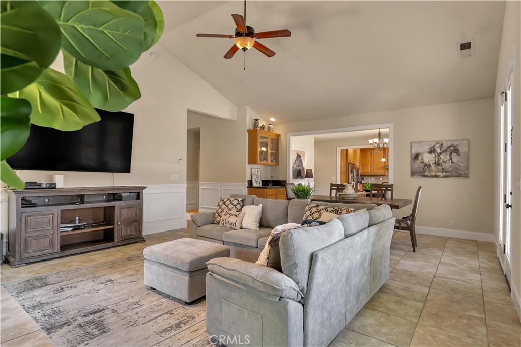 39 Redeemers Loop Chico, CA 95973 - Photo 10 of 55 a living room with furniture and a flat screen tv