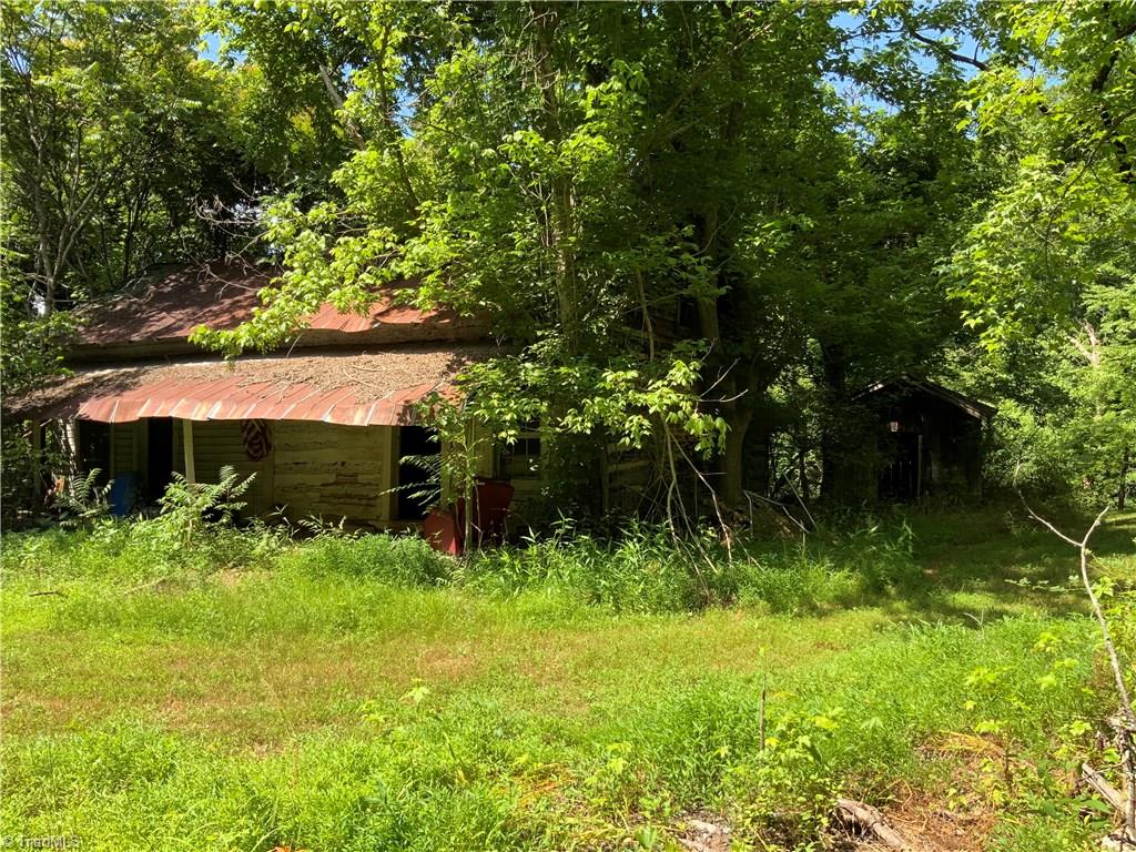 241 Dan River Road Madison, NC 27025 - Photo 29 of 30 Old Log Cabin