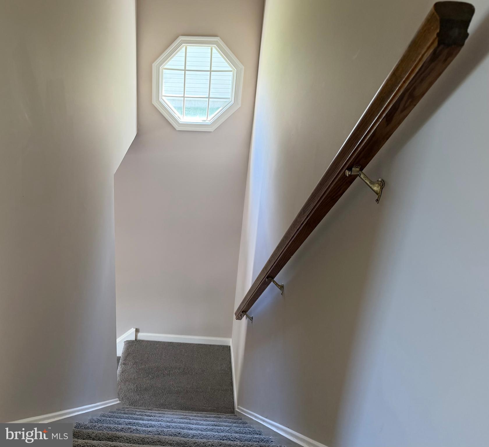 1514 Ravena Street, Unit Q Bethlehem, PA 18015 - Photo 18 of 22 Stairs Accented By Octagonal Window