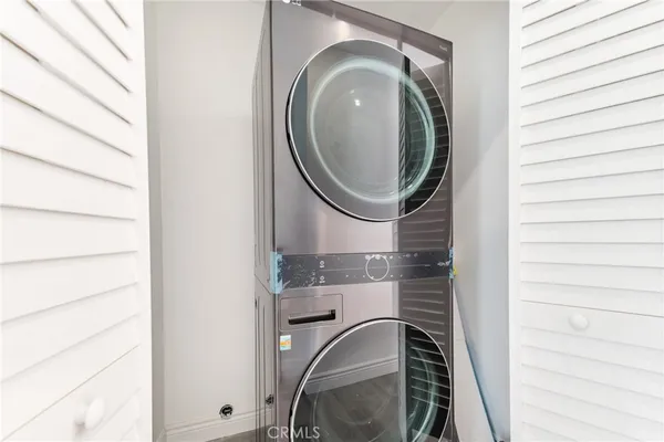 a close view of a utility room with washer and dryer