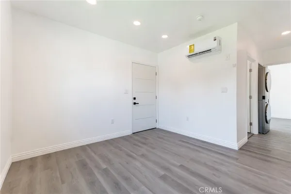a view of a livingroom with wooden floor