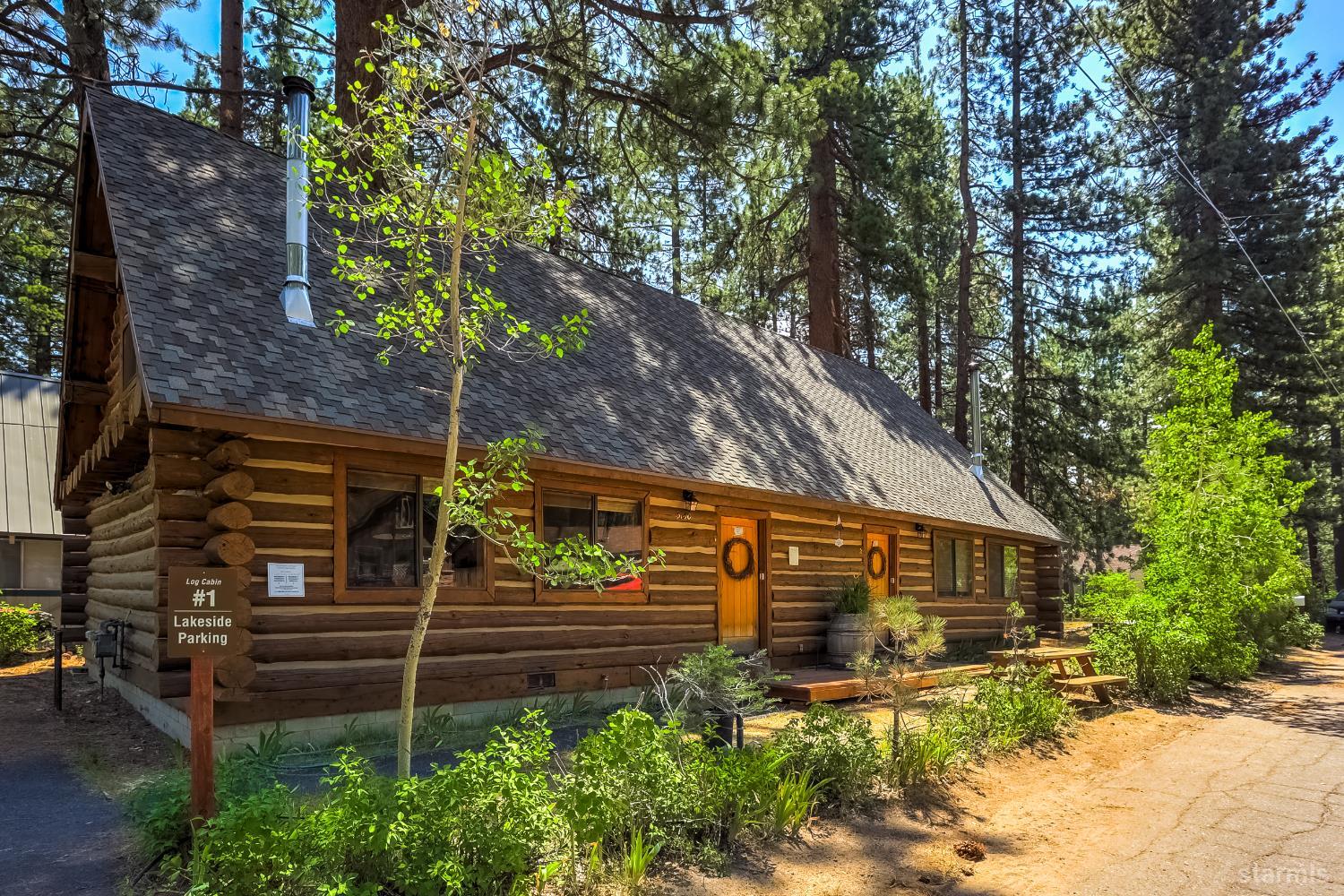 3140 Sacramento Avenue South Lake Tahoe, CA 96150 - Photo 2 of 30 a front view of a house with a yard