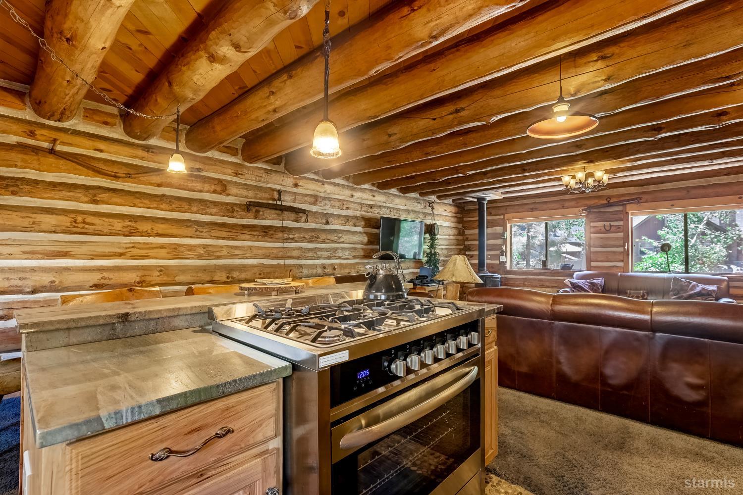3140 Sacramento Avenue South Lake Tahoe, CA 96150 - Photo 21 of 30 a kitchen with a stove and a microwave