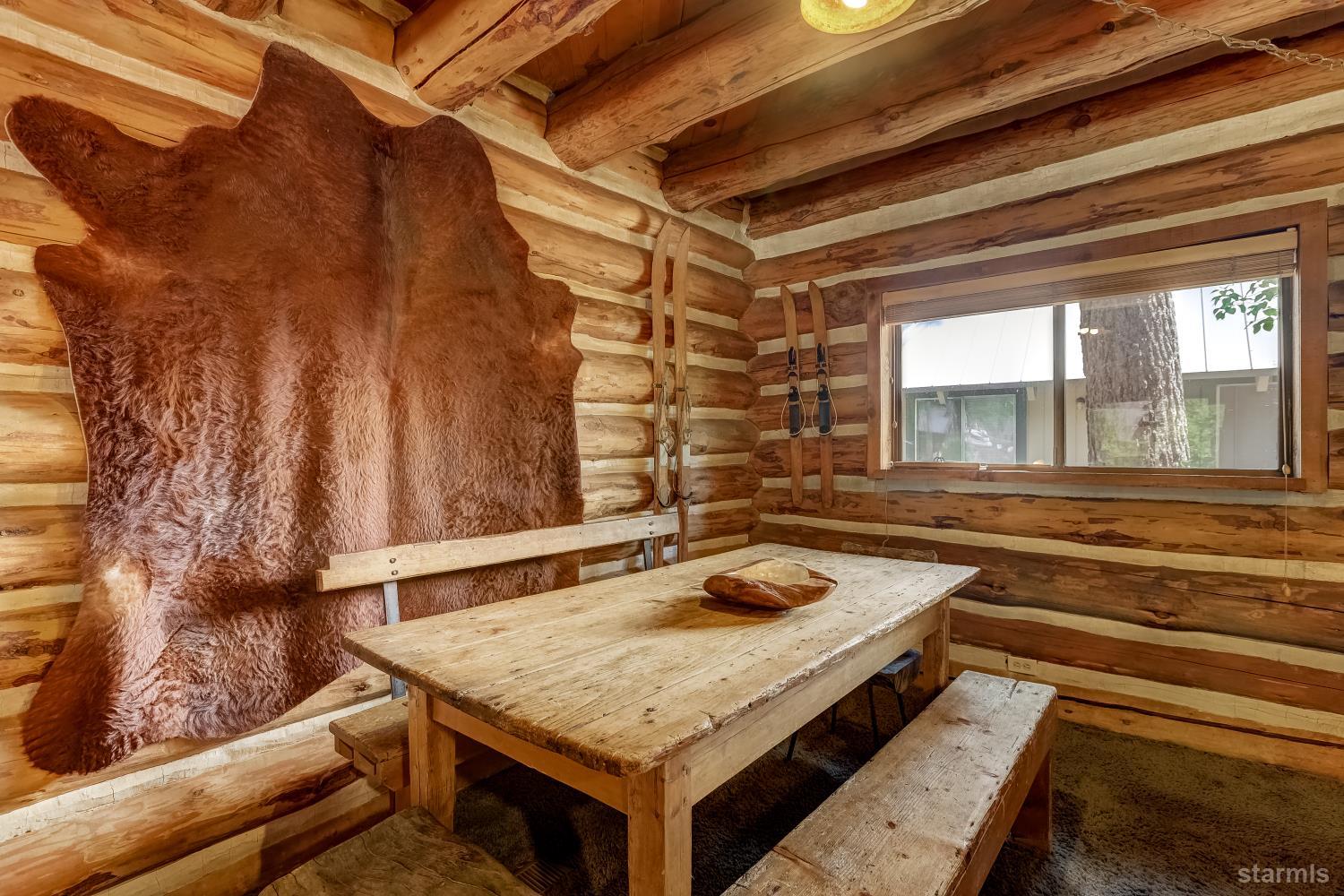 3140 Sacramento Avenue South Lake Tahoe, CA 96150 - Photo 22 of 30 a bathroom with a granite countertop sink and a mirror